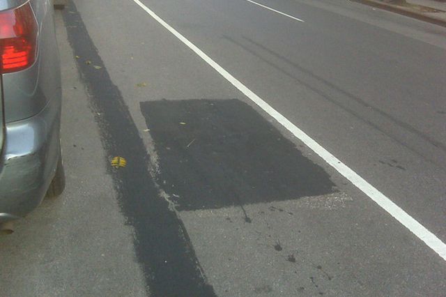 Twitter user WmsbgNews captioned this photo "DOT painted black the line painted by the Hipsters."